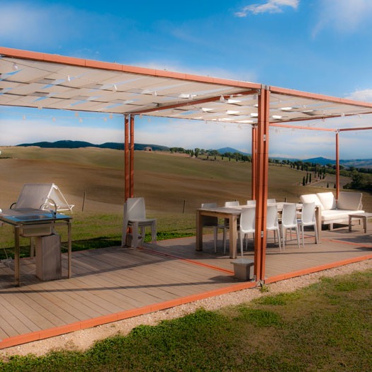 thinnest possible enclosure marks out this outdoor room in the Tuscan countryside