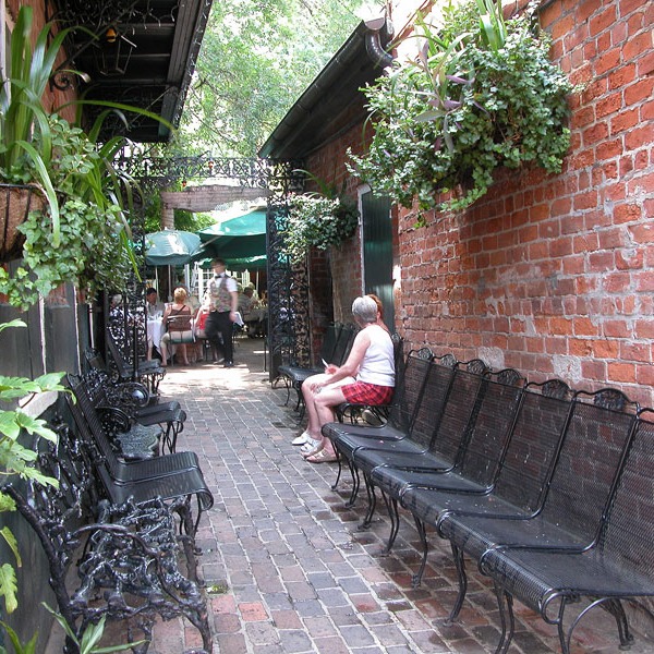 French Quarter garden passage leads to larger dining court