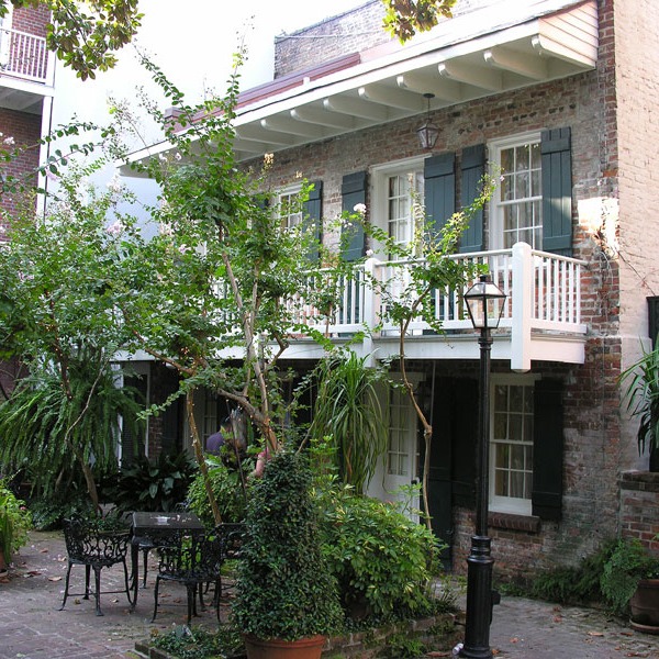 main house & guest cottage flank French Quarter garden room