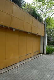 Sao Paulo, Brazil steel garage door with electric fence above