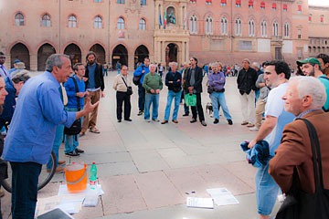 citizens debating issues in Bologna piazza