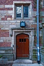 doorway and downspout in stone and brick wall at Yale University