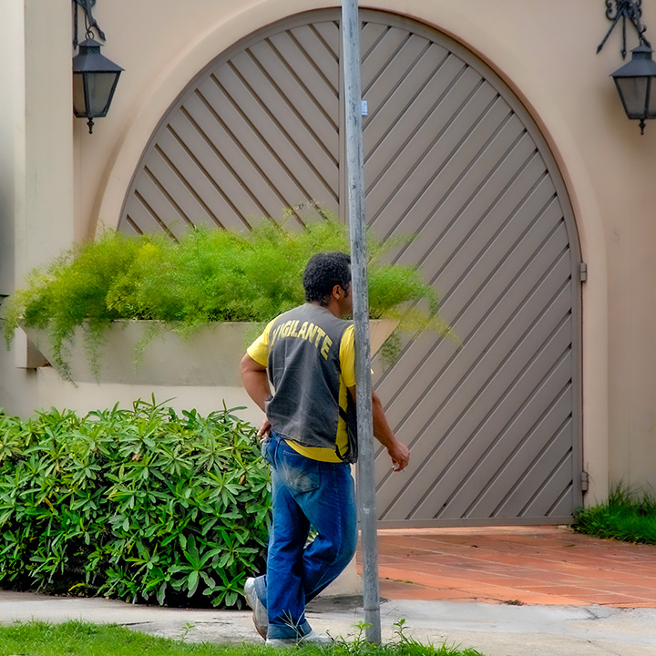 vigilante standing guard in São Paulo neighborhood