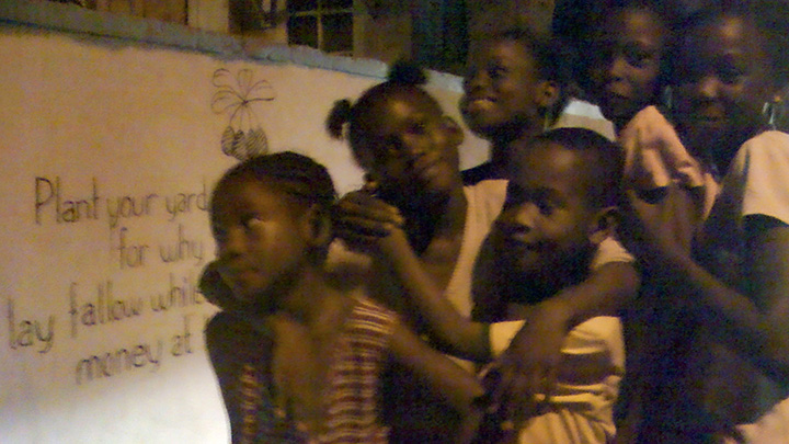 Jamaican children singing a new song at night