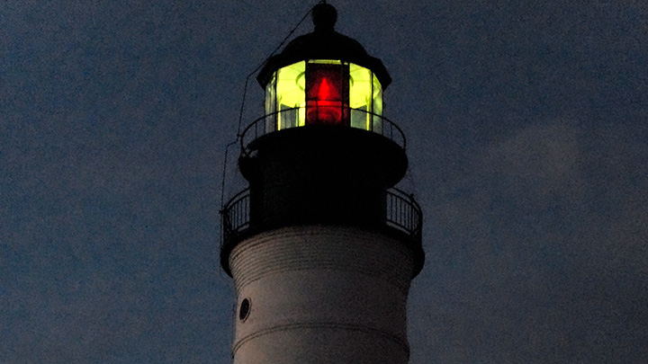 Key West lighthouse alight at nightfall