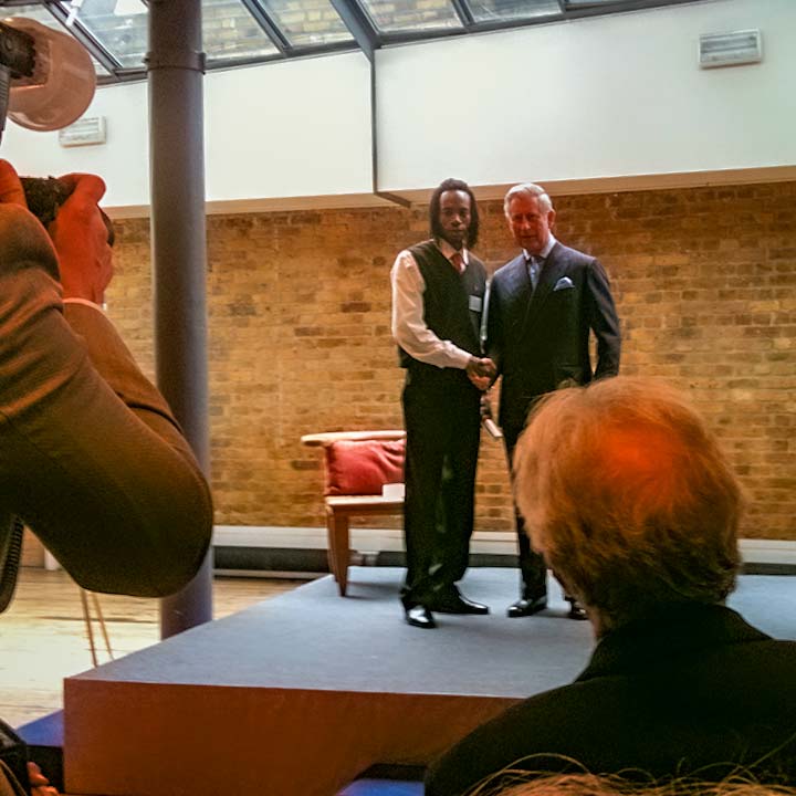 Prince Charles and New Orleans craft apprentice at graduation in London