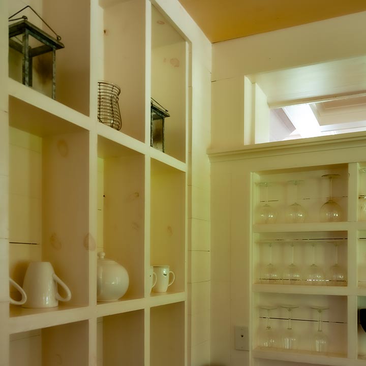 open walls with shelves in 2001 Coastal Living Idea House, Habersham, South Carolina