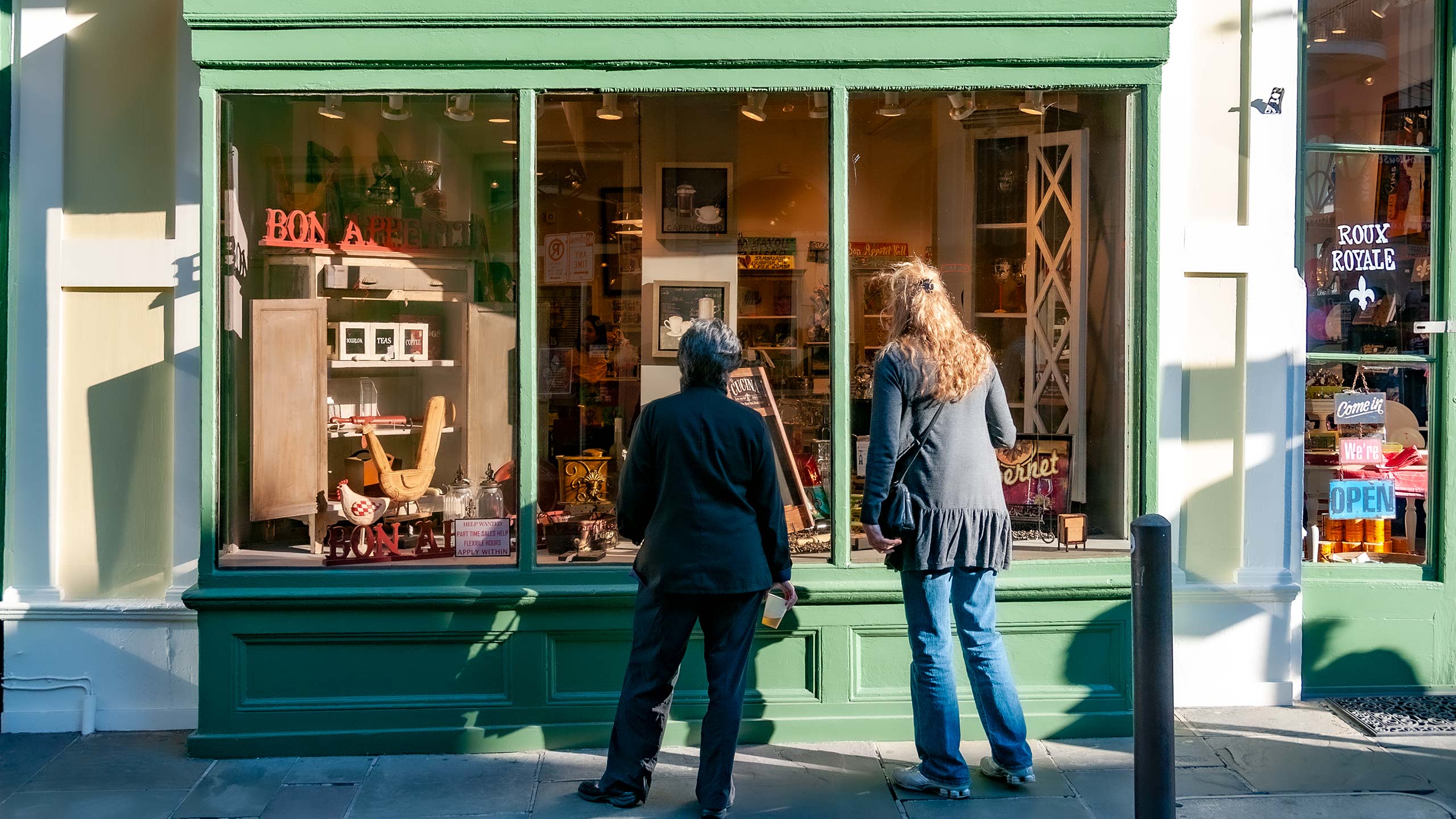 Ann Daigle and Wanda Mouzon shopping at a French Quarter storefront in New Orleans