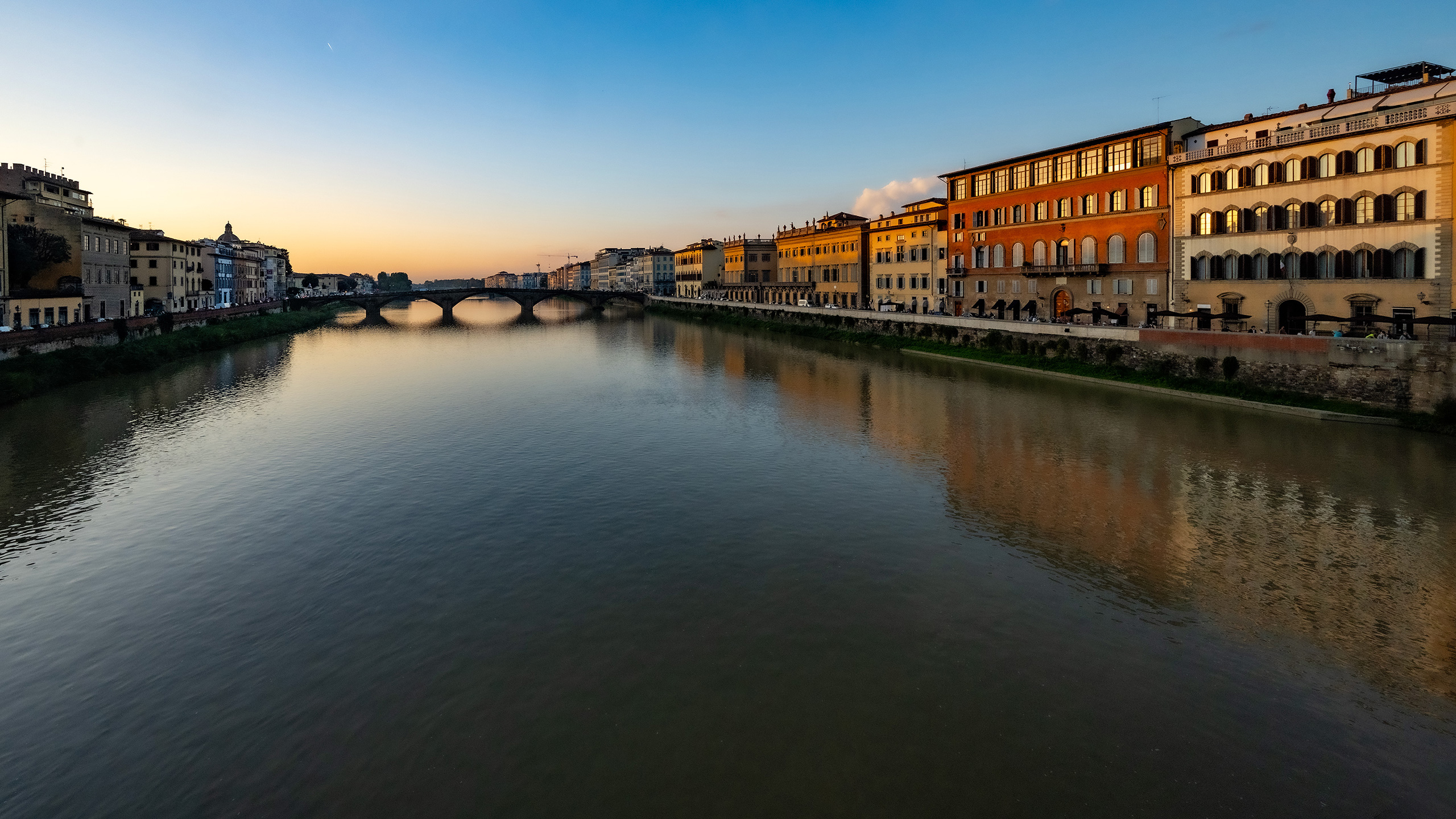 buildings flanking the Arno River in Florence, looking right from Ponte Vecchio