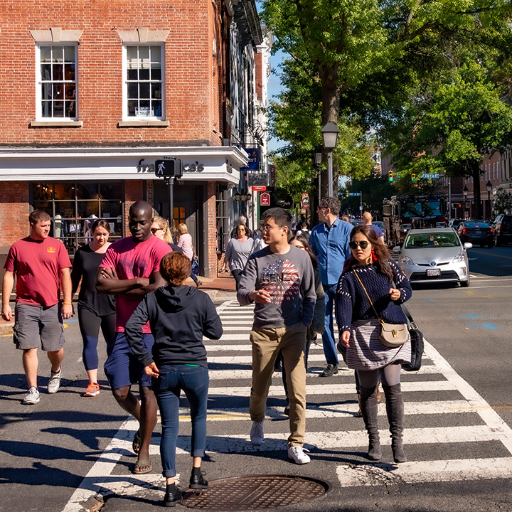 young people crossing the street at an Alexandria, Virginia crosswalk