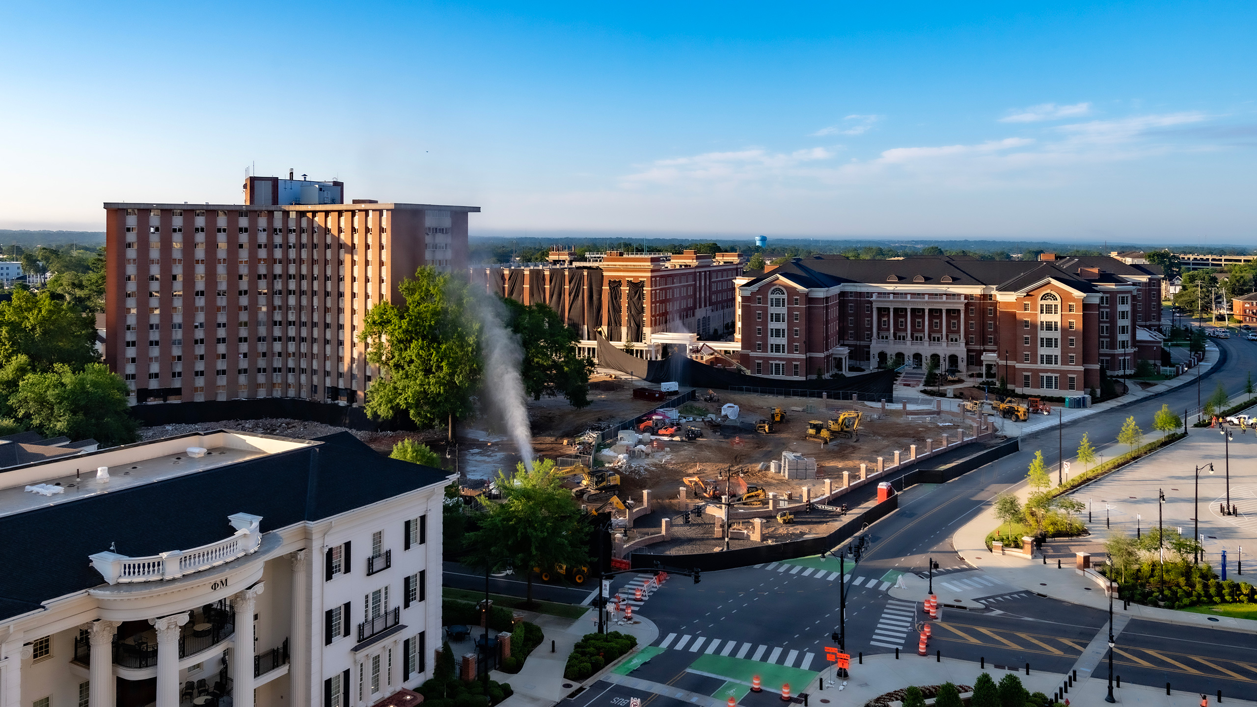 Tutwiler Hall at the University of Alabama about to be imploded on the left and the new Tutwiler Hall on the right