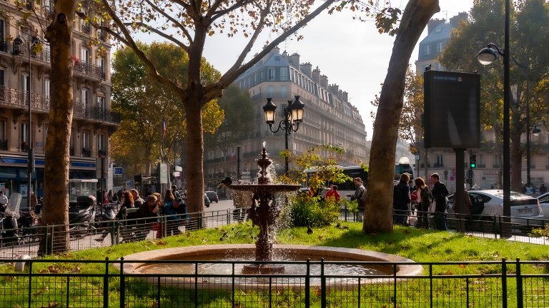 Squares in the US are often the size of an entire block or more, but this scene in Paris is a fraction of that, but thoroughly delightful. Look around town for leftover snippets of land and ask yourself "how might this place delight us all?This tiny Paris park is more of a Gift to the Street than an actual inhabitable place, but it does a great job of delighting many who walk by. &copy;2012 Stephen A. Mouzon