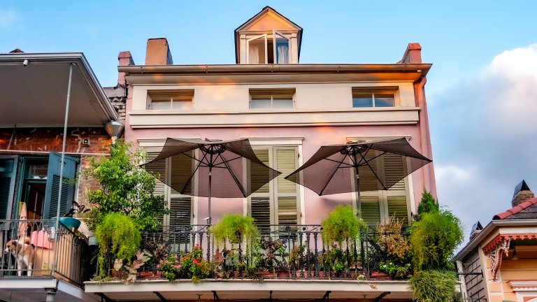 So much delight in so little space! French Quarter balconies are rarely much over 3 feet deep, but look at all the gardening this building's occupant is doing on this balcony! And what a Gift to the Street! &copy;2009 Stephen A. Mouzon