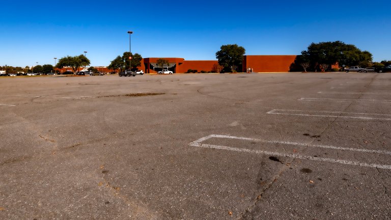 A Black Friday parking lot in Tuscaloosa, Alabama. The spaces you see empty in this image will never again be parked in by customers of this shopping mall. Black Friday empty spaces are America&rsquo;s greatest redevelopment opportunity.

Good phrase from Andres Duany earlier today: &quot;... as the glacier of parking recedes...&quot;
This from Black Friday 2001. Those spaces will never be parked in again by people shopping here. &copy;2021 Stephen A. Mouzon